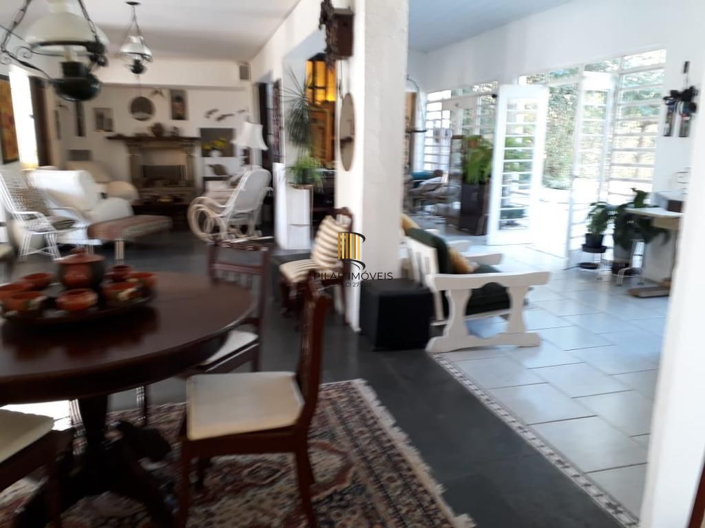 Sobrado com 4 dormitórios à venda, 498 m² por R$ 2.180.000,00 - Vila Jardim - Porto Alegre/RS