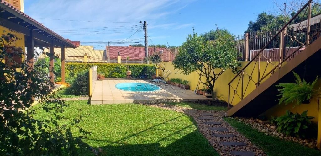 Casa com 5 dormitórios à venda, 509 m² por R$ 1.690.000,00 - Rubem Berta - Porto Alegre/RS