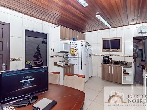 Casa com 3 dormitórios à venda, 180 m² por R$ 495.000,00 - Parque Santa Fé - Porto Alegre/RS