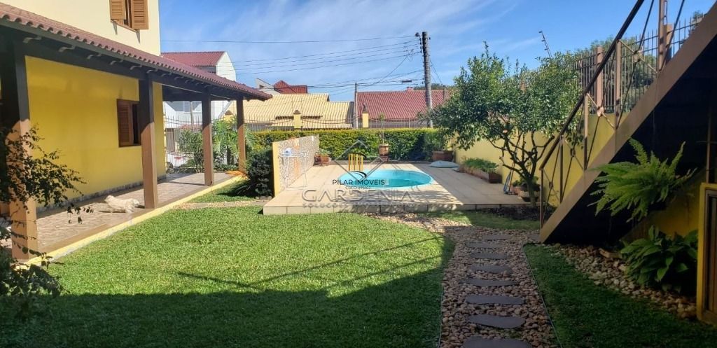 Casa com 5 dormitórios à venda, 509 m² por R$ 1.690.000,00 - Rubem Berta - Porto Alegre/RS - Pilar Imóveis