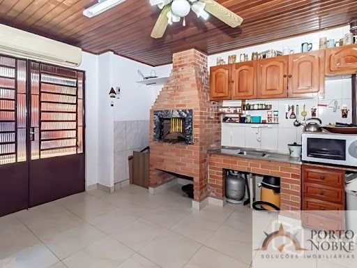 Casa com 3 dormitórios à venda, 180 m² por R$ 495.000,00 - Parque Santa Fé - Porto Alegre/RS