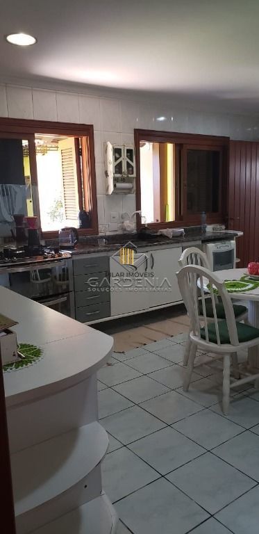 Casa com 5 dormitórios à venda, 509 m² por R$ 1.690.000,00 - Rubem Berta - Porto Alegre/RS