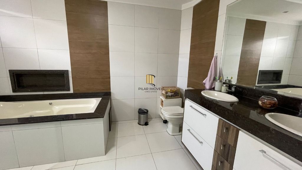 Casa com 3 dormitórios à venda, 242 m² por R$ 1.330.000,00 - Ecoville - Porto Alegre/RS