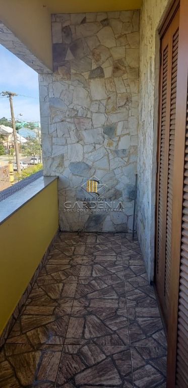 Casa com 5 dormitórios à venda, 509 m² por R$ 1.690.000,00 - Rubem Berta - Porto Alegre/RS