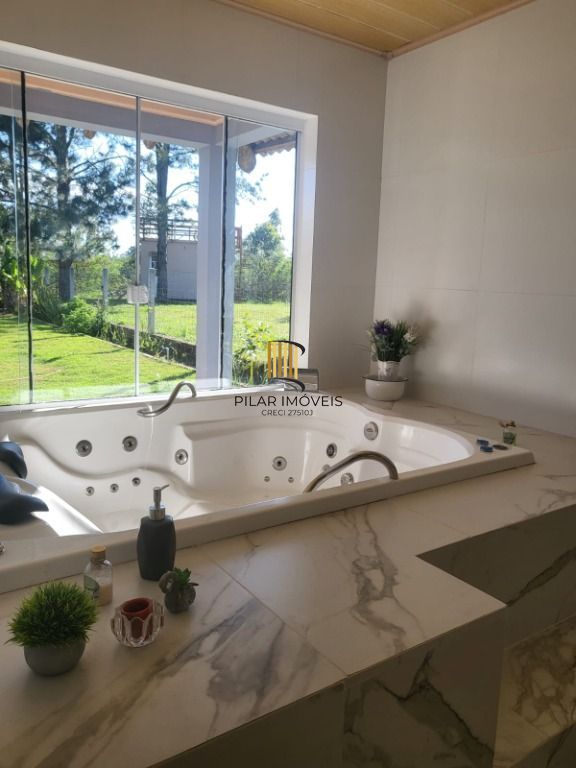 Casa com 3 dormitórios à venda, 250 m² por R$ 600.000,00 - Águas Claras - Viamão/RS