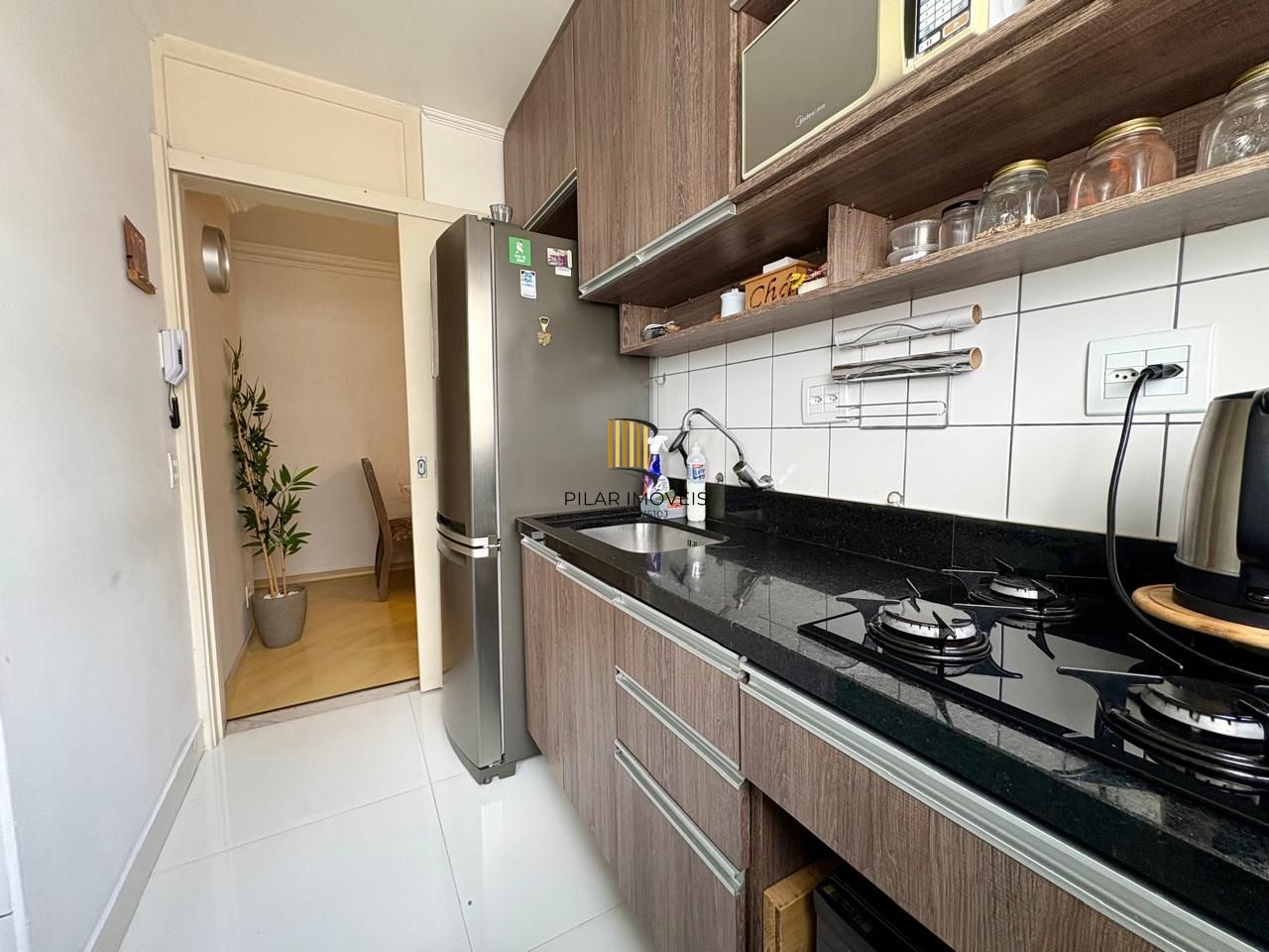 Apartamento 2 dormitórios com sacada e churrasqueira e vaga de garagem coberta
