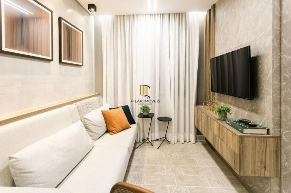 Apartamento em Porto Alegre, no bairro Guarujá, com 2 dormitório(s), e 2 banheir