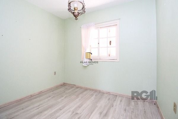 Casa Condominio em Porto Alegre, no bairro Guarujá, com 3 dormitório(s), e 3 ban