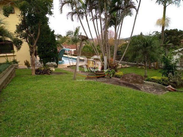 Casa para Venda - 741m², 5 dormitórios, sendo 3 suites, 9 vagas - Espirito Santo