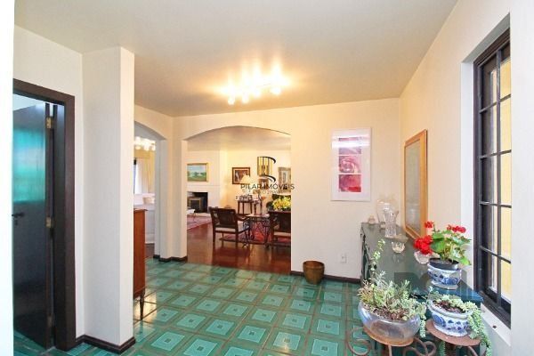 Casa Condominio em Porto Alegre, no bairro Cavalhada, com 4 dormitório(s), e 4 b