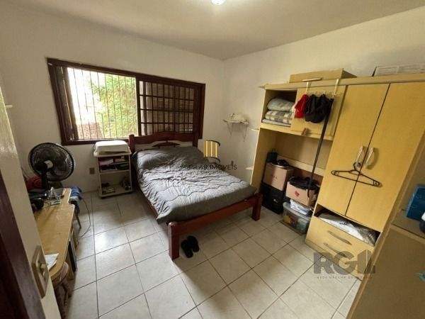 Casa térrea de 3D no miolo do Bairro Tristeza.