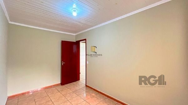 Casa em Porto Alegre, no bairro Vila Nova, com 2 dormitório(s), à venda.