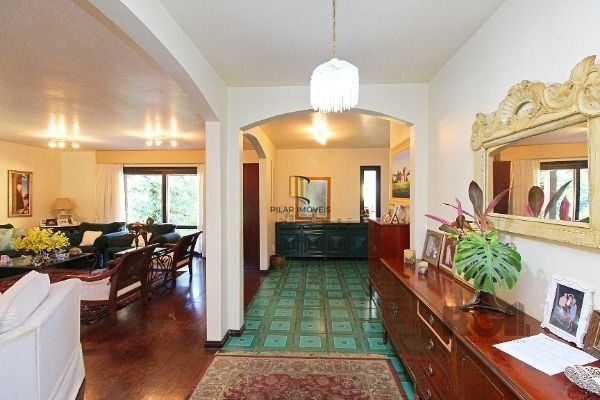 Casa Condominio em Porto Alegre, no bairro Cavalhada, com 4 dormitório(s), e 4 b