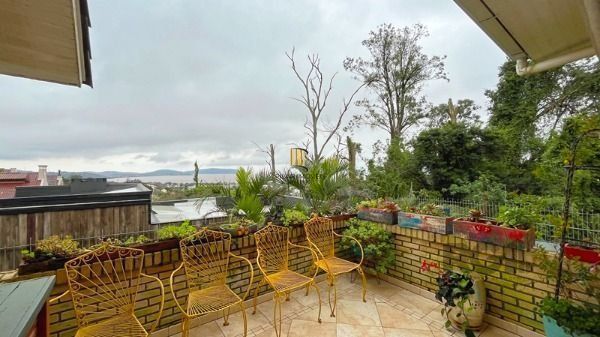 Casa Condominio em Porto Alegre, no bairro Jardim Isabel, com 3 dormitório(s), à