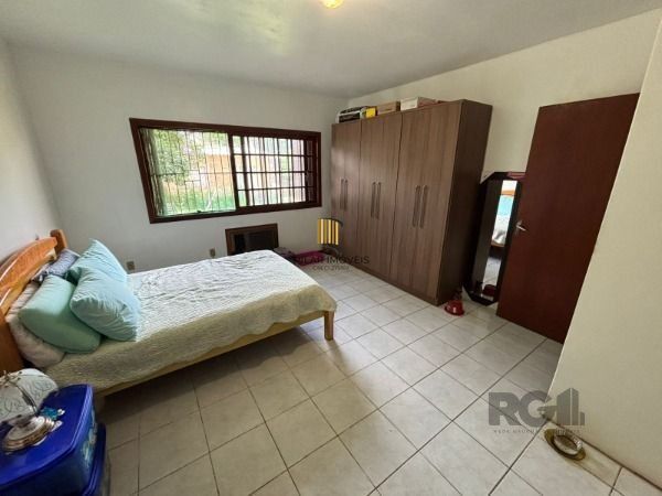 Casa térrea de 3D no miolo do Bairro Tristeza.