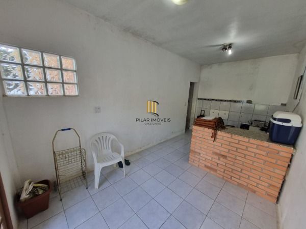 Sobrado em Porto Alegre, no bairro Ponta Grossa, com 4 dormitório(s), e 4 banhei