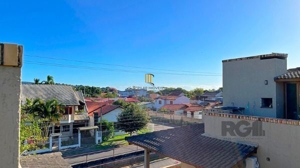 Casa Condominio em Porto Alegre, no bairro Guarujá, com 2 dormitório(s), e 2 ban