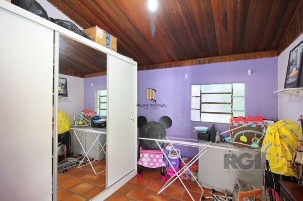Casa em Porto Alegre, no bairro Tristeza, com 4 dormitório(s), à venda.