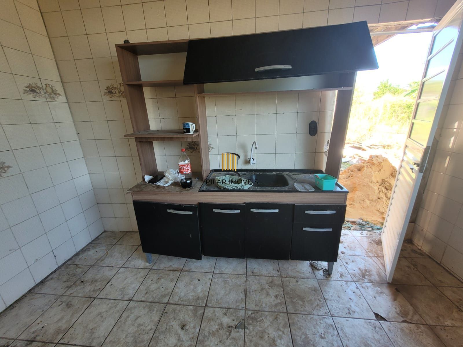 Ótimo terreno com casa na Ponta Grossa.