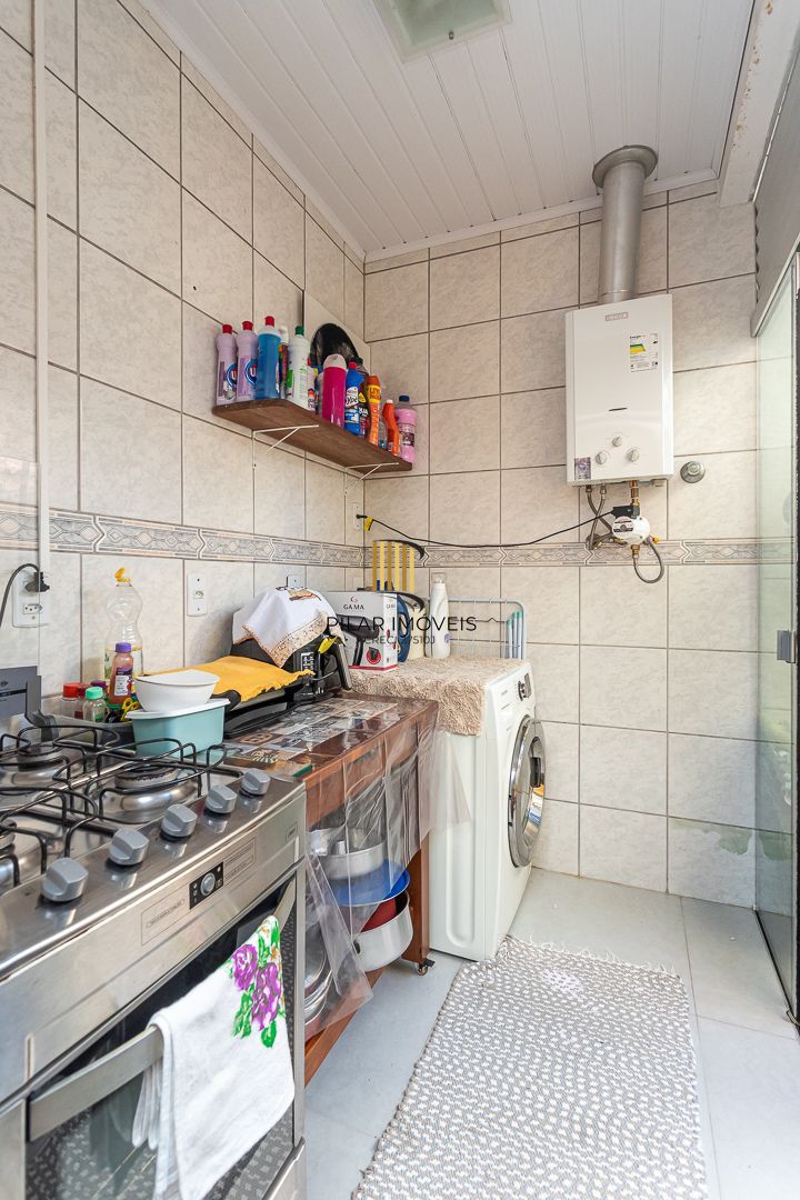 Casa em condomínio à venda com 97m², 2 dormitórios e 2 vagas, no bairro Tristeza em Porto Alegre.