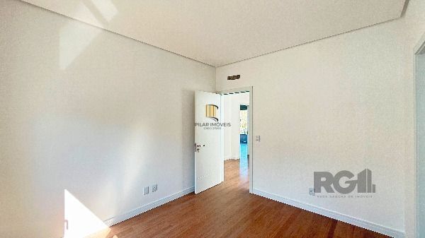 Casa Condominio em Porto Alegre, no bairro Hípica, com 3 dormitório(s), e 3 banh