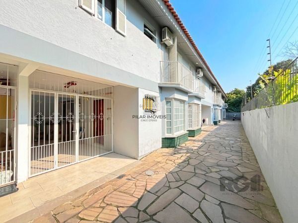 Casa Condominio em Porto Alegre, no bairro Tristeza, com 3 dormitório(s), e 3 ba