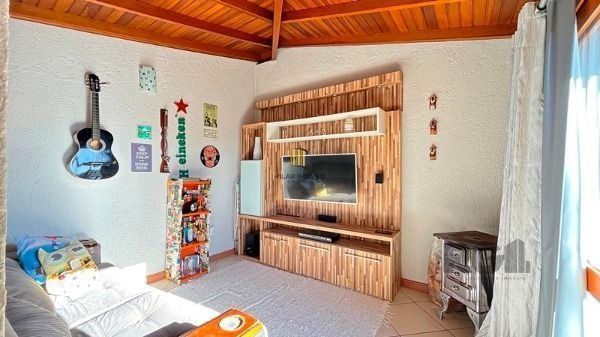 Casa Condominio em Porto Alegre, no bairro Guarujá, com 2 dormitório(s), e 2 ban