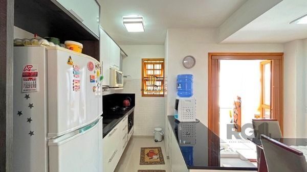 Casa Condominio em Porto Alegre, no bairro Tristeza, com 3 dormitório(s), e 3 ba