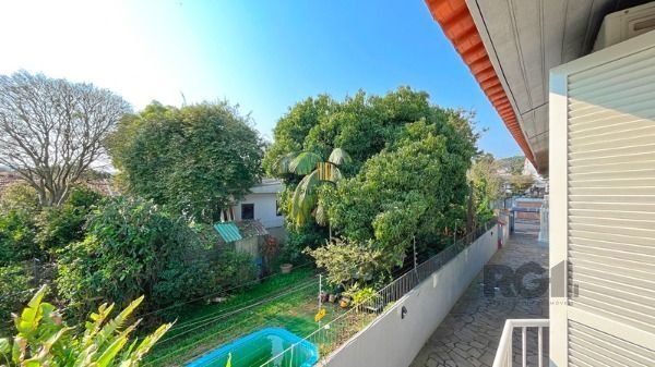 Casa Condominio em Porto Alegre, no bairro Tristeza, com 3 dormitório(s), e 3 ba