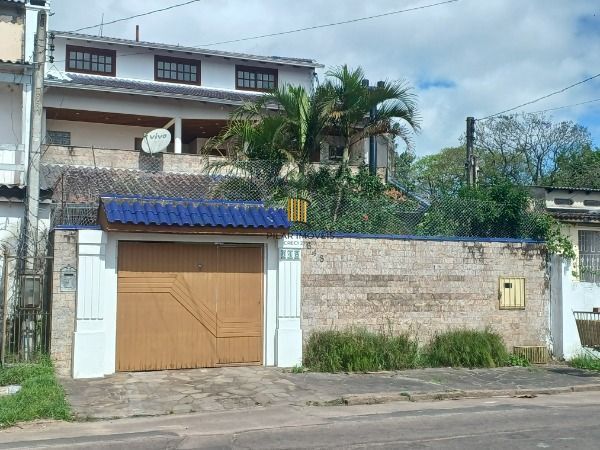 Casa em Porto Alegre, no bairro Restinga, com 4 dormitório(s), e 4 banheiros, à  - Pilar Imóveis