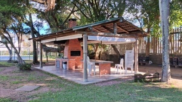 Casa Condominio em Porto Alegre, no bairro Cavalhada, com 4 dormitório(s), e 4 b