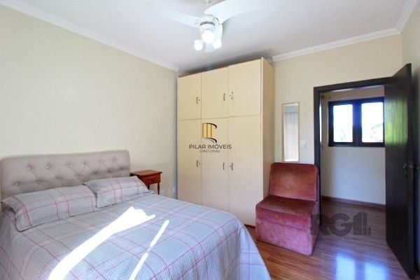 Casa Condominio em Porto Alegre, no bairro Cavalhada, com 4 dormitório(s), e 4 b