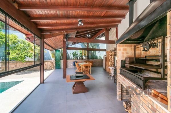 Residência com 4 dormitórios á venda no Bairro Jardim Izabel.