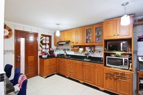 Casa para Venda - 399m², 4 dormitórios, sendo 1 suites, 6 vagas - Vila Nova