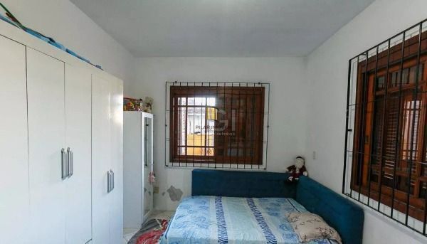 Casa em Porto Alegre, no bairro Cavalhada, com 5 dormitório(s), e 5 banheiros, à