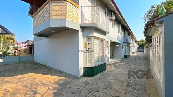 Casa Condominio em Porto Alegre, no bairro Tristeza, com 3 dormitório(s), e 3 ba