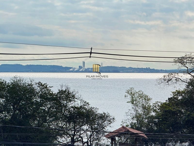 Casa com vista para o Rio e 3 dormitórios