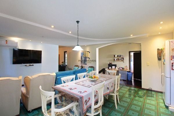 Casa Condominio em Porto Alegre, no bairro Cavalhada, com 4 dormitório(s), e 4 b