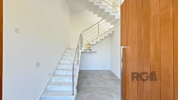 Casa Condominio em Porto Alegre, no bairro Hípica, com 3 dormitório(s), e 3 banh