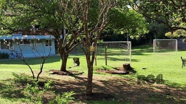 Casa Condominio em Porto Alegre, no bairro Cavalhada, com 4 dormitório(s), e 4 b