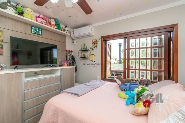 Residência com 4 dormitórios á venda no Bairro Jardim Izabel.