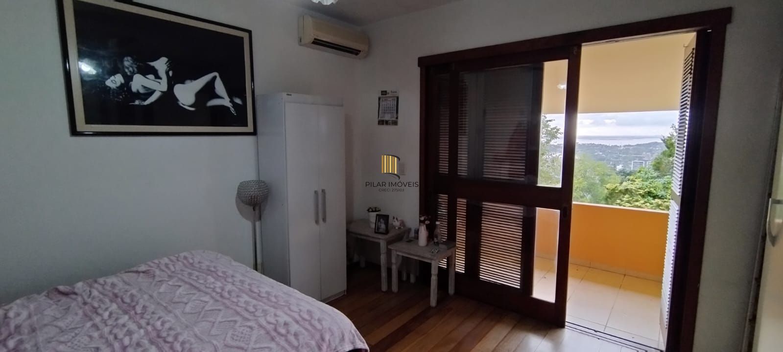 Casa Residencial com vista incrível para o Rio Guaíba no bairro Vila Conceição.