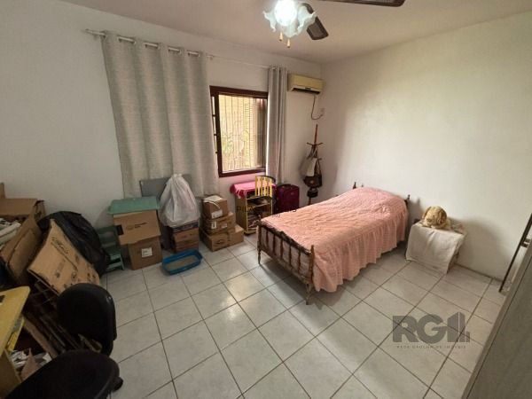 Casa térrea de 3D no miolo do Bairro Tristeza.