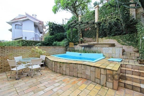 Casa Condominio em Porto Alegre, no bairro Sétimo Céu, com 4 dormitório(s), e 4 