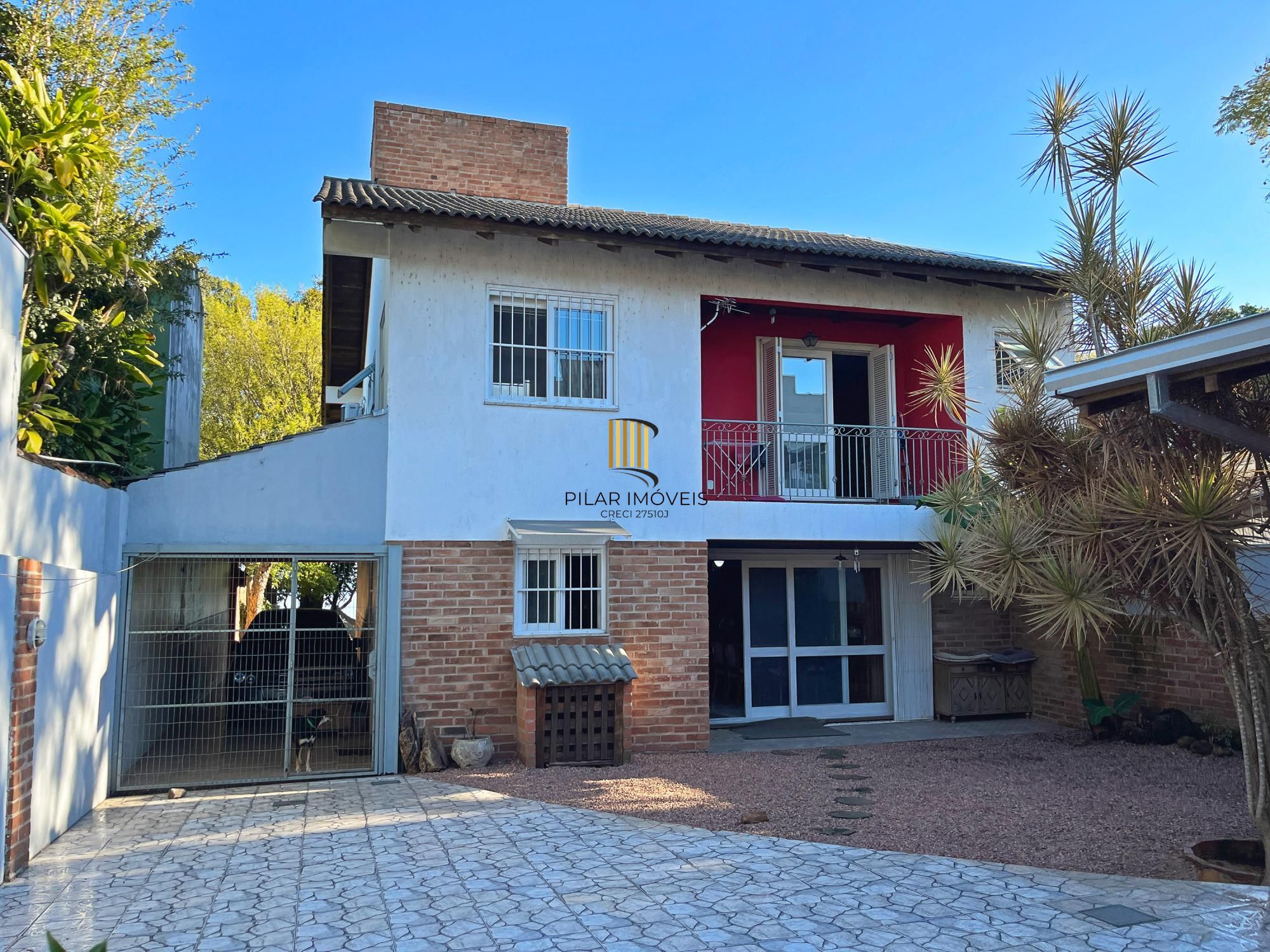 Casa 4 dormitórios no bairro Ipanema
