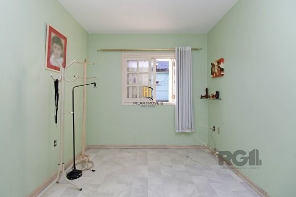 Casa Condominio em Porto Alegre, no bairro Guarujá, com 3 dormitório(s), e 3 ban