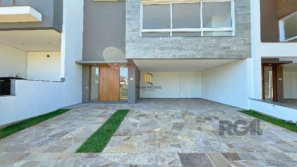 Casa Condominio em Porto Alegre, no bairro Hípica, com 3 dormitório(s), e 3 banh