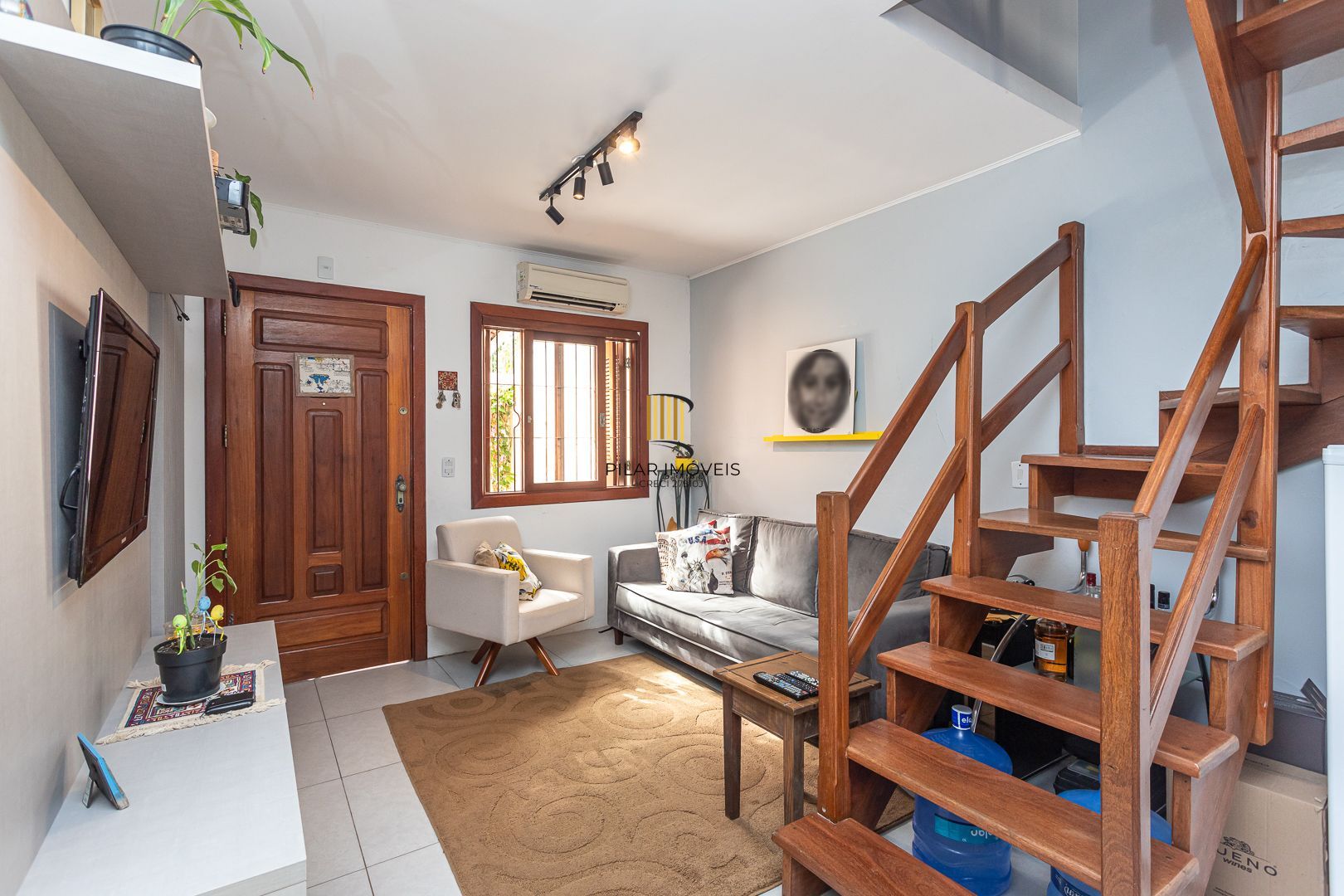 Casa em condomínio à venda com 97m², 2 dormitórios e 2 vagas, no bairro Tristeza em Porto Alegre.