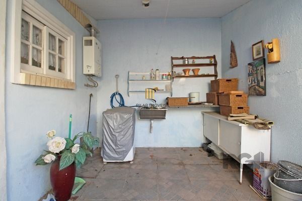 Casa Condominio em Porto Alegre, no bairro Guarujá, com 3 dormitório(s), e 3 ban