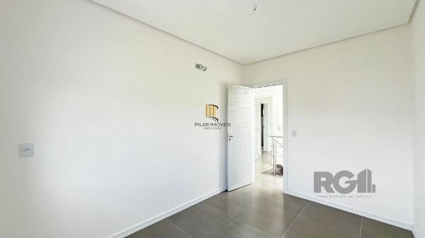 Casa Condominio em Porto Alegre, no bairro Campo Novo, com 3 dormitório(s), e 3 